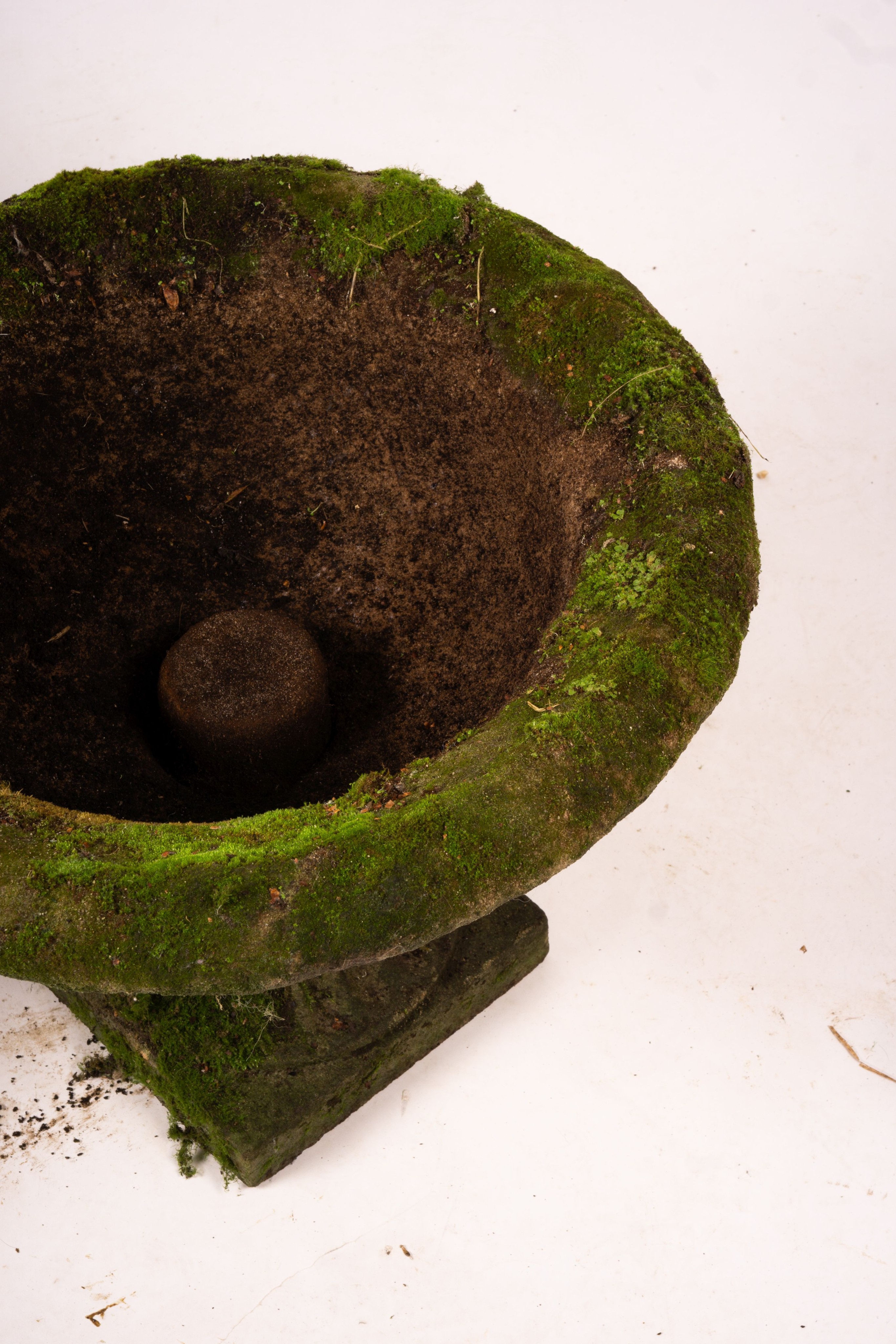 A pair of weathered reconstituted stone campana garden urns, Diam.56cm H.42cm